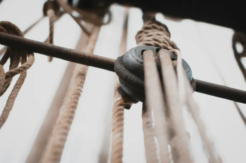 Rope running through a pulley block on a rig